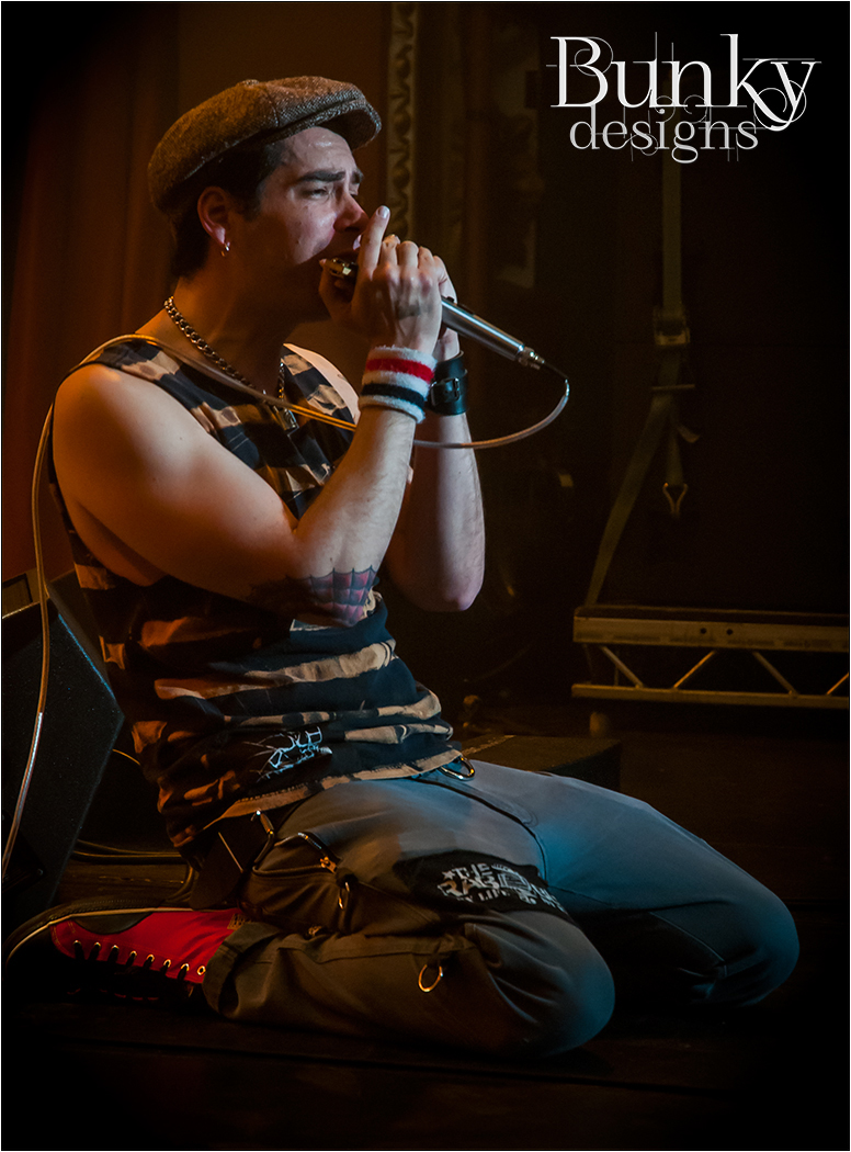 Bruce Tality on Harmonica (Kneeling) at The Big Gig June 2012